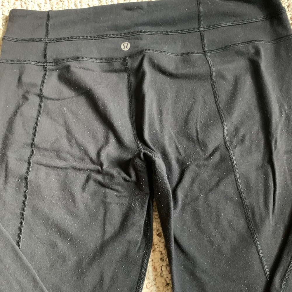 Lululemon black flare leg full length pant size 10